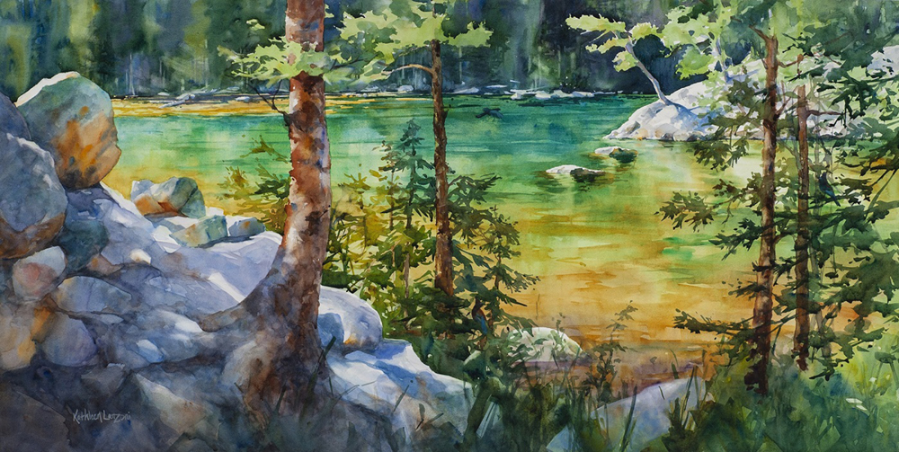 Watercolor painting of a turquoise lake with boulders and trees on the banks