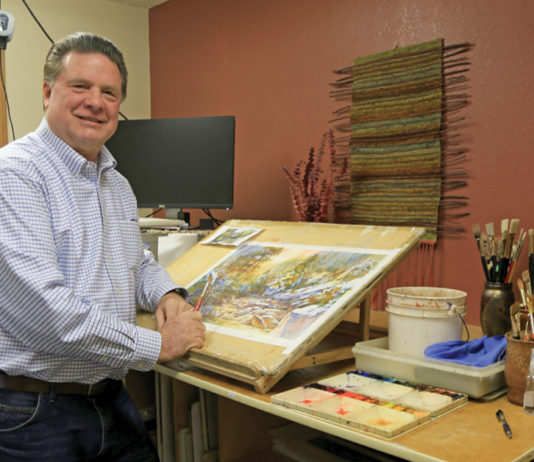 Male artist in his studio