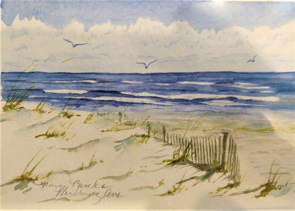Watercolor painting of a beach with ocean waves in the background